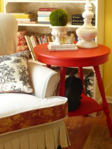 Toile pillow on slipcovered chair