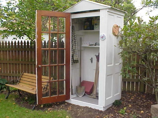 small garden shed made from doors