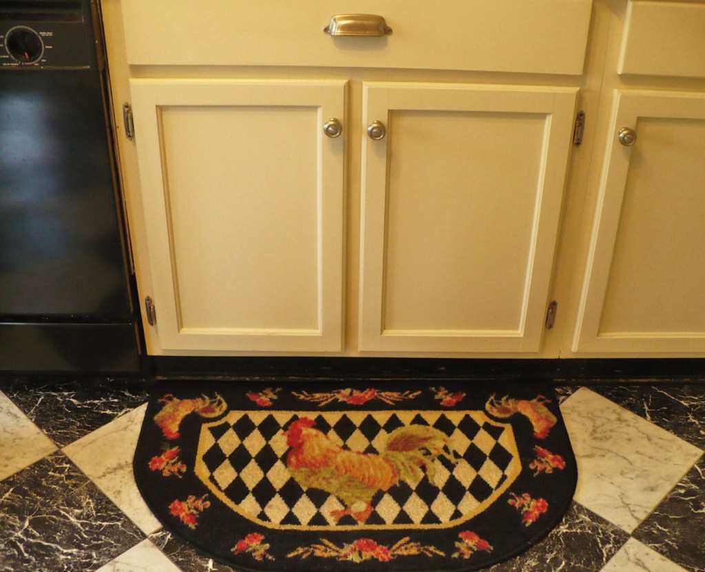 under sink cabinets and rooster rug