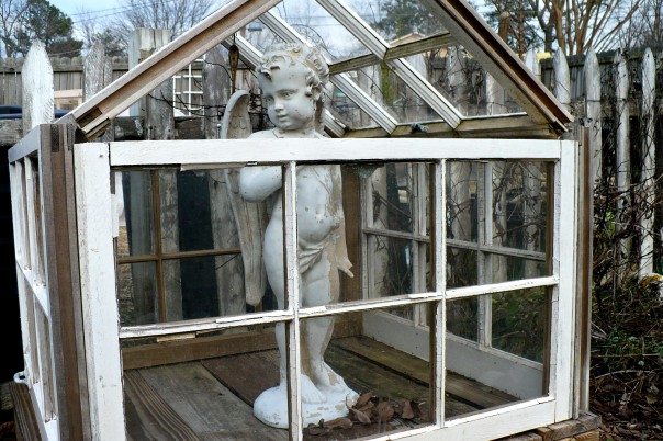 recycled windows into a little greenhouse