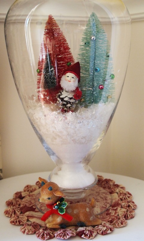 apothecary jar with bottlebrush trees