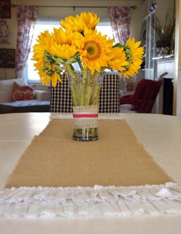 flowers on a burlap runner