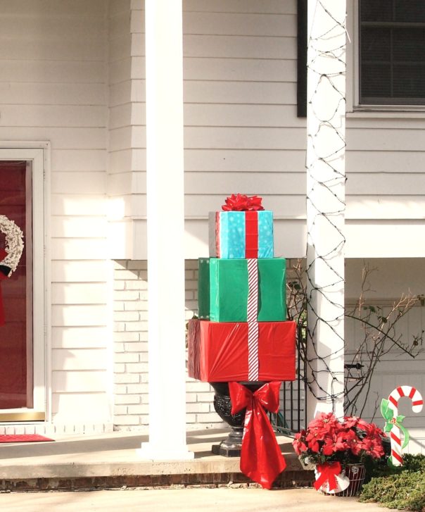 Great holiday curb appeal projects. Make a Outdoor Christmas present topiary.