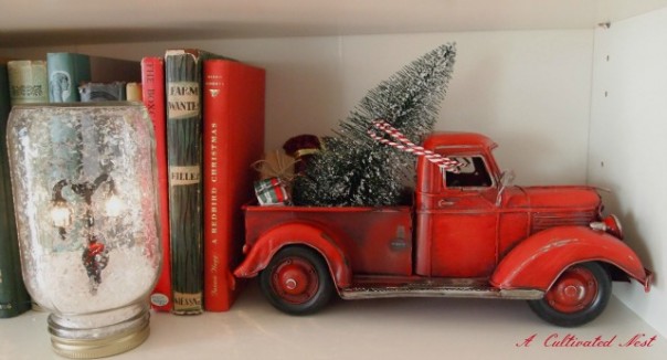 red toy truck with Christmas tree