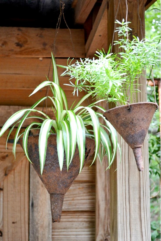 15 Creative Garden Upcycle Containers- From repurposed materials to artsy designs, these unique planters are perfect for adding a personal touch to your green oasis. Check out all these creative DIY garden containers for inspiration! | #gardening #upcycling #DIY #gardenIdeas #ACultivatedNest