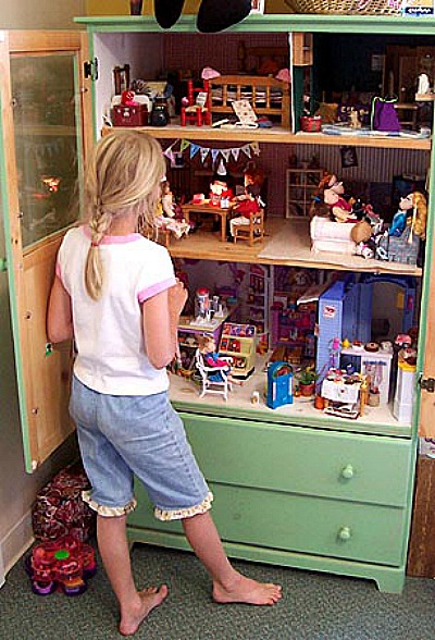 Dresser Dollhouse- If you have an old dresser, it could be turned into something new, useful, and beautiful! For inspiration, check out these 12 clever ways to repurpose an old dresser! | DIY furniture makeover, upcycle a dresser, #repurpose #upcycle #furniture #DIYProject #ACultivatedNest