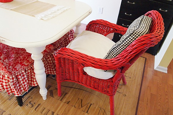 red wicker chair in the dining room