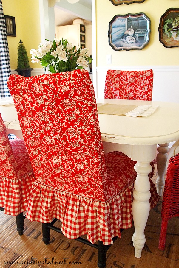 red toile and checks slipcovered dining room chairs