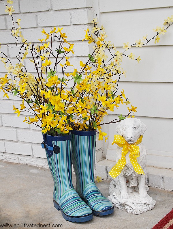 10 Adorable Rain Boot Planter DIYs- These DIY rain boot planter ideas are a cute way to decorate for spring, and a great idea for repurposing old or out grown rubber boots! | #rainBoots #diyPlanter #flowerGardening #springDecorating #ACultivatedNest