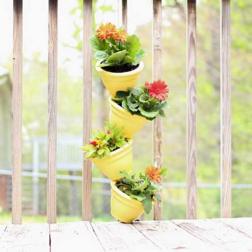 15 Amazing Flower Tower/Tipsy Pot Planter Ideas- These DIY flower towers and tipsy pot planters are stunning ways to add vertical interest to your garden, porch, or front entry! | #tipsyPot #flowerTower #DIY #gardening #ACultivatedNest