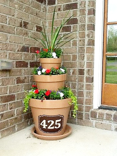 15 Amazing Flower Tower/Tipsy Pot Planter Ideas- These DIY flower towers and tipsy pot planters are stunning ways to add vertical interest to your garden, porch, or front entry! | #tipsyPot #flowerTower #DIY #gardening #ACultivatedNest