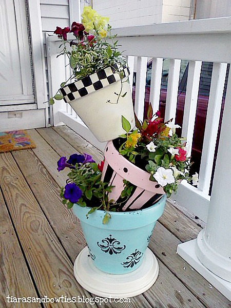 15 Amazing Flower Towers or Tipsy Pot Planters Ideas- These DIY flower towers and tipsy pot planters are stunning ways to add vertical interest to your garden, porch, or front entry! | #tipsyPot #flowerTower #DIY #gardening #ACultivatedNest