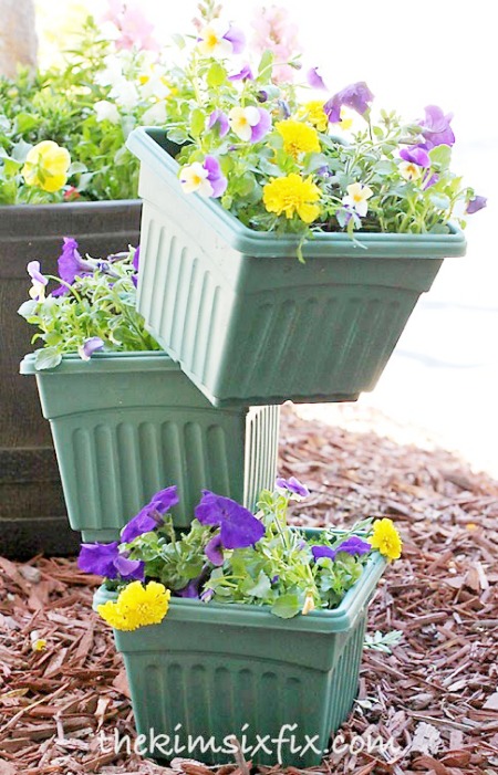 15 Amazing Flower Towers or Tipsy Pot Planters Ideas- These DIY flower towers and tipsy pot planters are stunning ways to add vertical interest to your garden, porch, or front entry! | #tipsyPot #flowerTower #DIY #gardening #ACultivatedNest