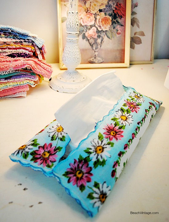 Upcycled Hankie Tissue Holder- Don't let your pretty antique handkerchiefs stay locked away in a box. Instead, let everyone see and enjoy them by upcycling them into something new and beautiful! Check out these 10 adorable ways to repurpose vintage hankies! | #diy #upcycle #repurpose #reuse #sewing #hankies #handkerchiefs #vintage