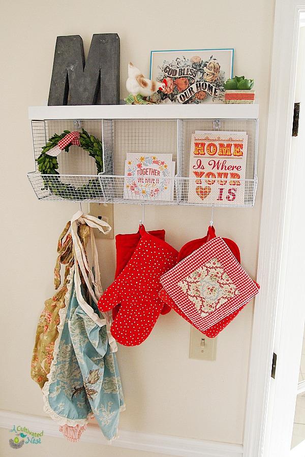 Pretty place to hang your aprons and pot holders. Great way to increase storage if you don't have lots of drawers in you kitchen.