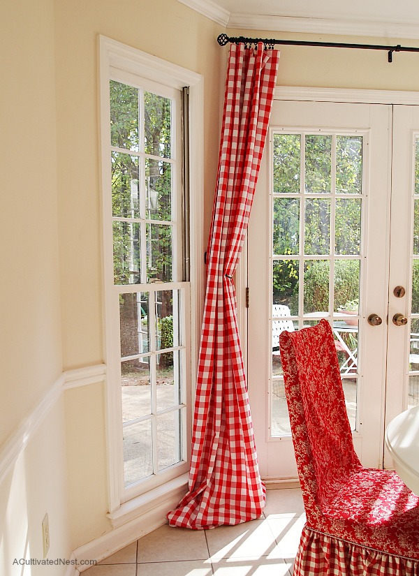 Inexpensive curtain idea - red buffalo check curtains are really tablecloths