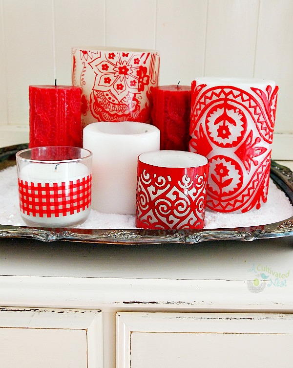 Christmas candle display on a vintage silver tray.