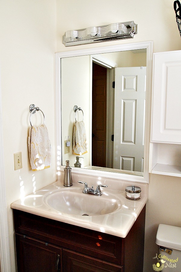 Sink area in yellow bathroom