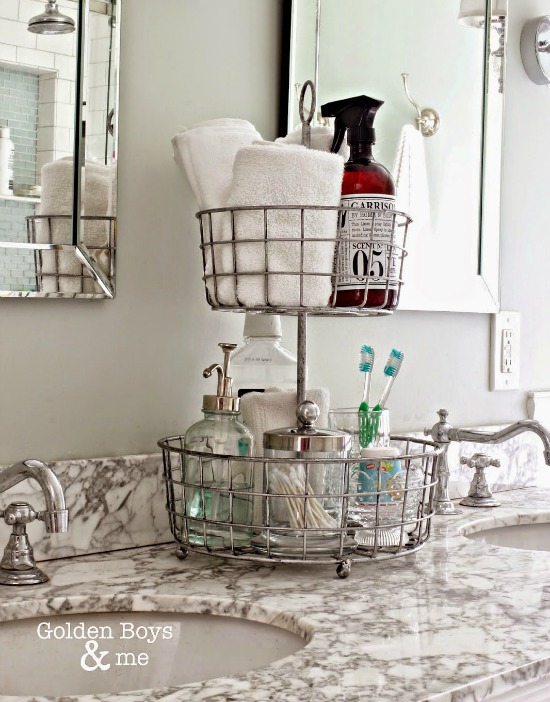 https://acultivatednest.com/wp-content/uploads/2015/01/organize-with-wire-baskets-in-bathroom.jpg