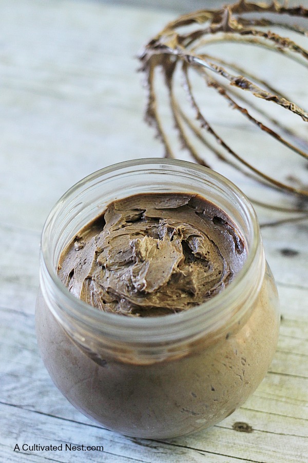 This homemade chocolate whipped body butter has just 4 simple ingredients and is free of much of the artificial ingredients that you find in store bought. It smells so chocolatey good you'll want to eat it! But....don't!