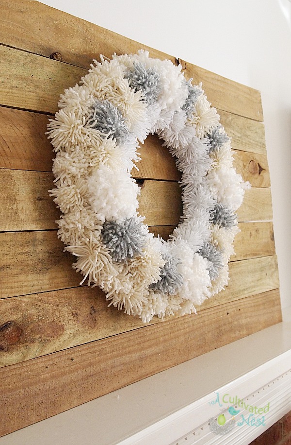 DIY Yarn Christmas Pom Pom Wreath - That Craft Site - fun and easy