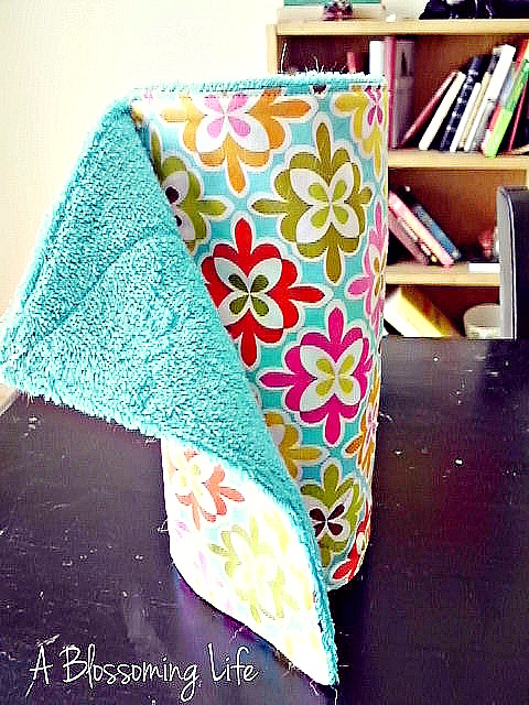 Un-paper Towels- You can easily save money and help the environment at the same time by making these DIY reusable products! They're so easy to make, and you can use your favorite colors! | eco friendly, frugal, ways to save money, wool dryer balls, cloth paper towels, unpaper towels, #frugal #diyProjects #ecoFriendly #saveMoney #ACultivatedNest