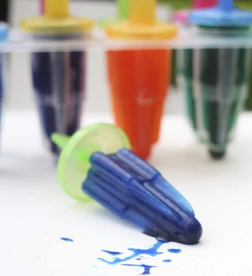 Popsicle Painting- Here are 10 inexpensive summer outdoor activities that will keep the kids or grandkids occupied all summer long! Definitely give these a try this summer! | #kidsActivities #frugalLiving #summerActivities #summerKidsActivities #ACultivatedNest