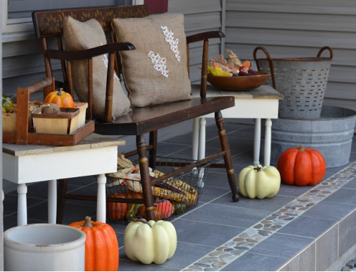 Vintage Front Porch- Unsure how to decorate your front porch for autumn? Take a look at these 15 fabulous fall front porch ideas and be inspired! | #fall #porchDecor #decorating #fallDecor #ACultivatedNest