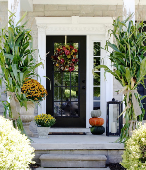 Charming Fall Porch- Unsure how to decorate your front porch for autumn? Take a look at these 15 fabulous fall front porch ideas and be inspired! | #fall #porchDecor #decorating #fallDecor #ACultivatedNest