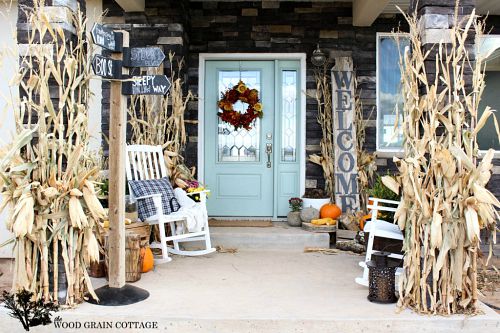 Deep Fall Front Porch- Unsure how to decorate your front porch for autumn? Take a look at these 15 fabulous fall front porch ideas and be inspired! | #fall #porchDecor #decorating #fallDecor #ACultivatedNest