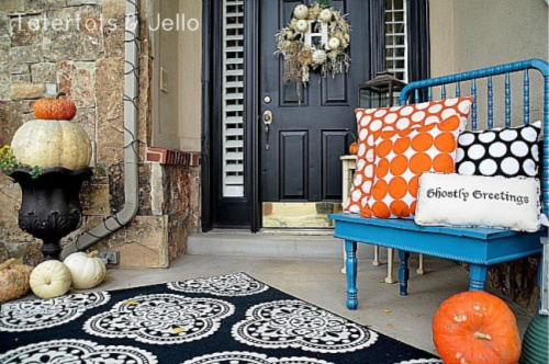 Polka Dot Front Porch- Unsure how to decorate your front porch for autumn? Take a look at these 15 fabulous fall front porch ideas and be inspired! | #fall #porchDecor #decorating #fallDecor #ACultivatedNest