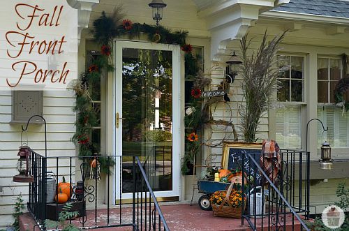 Garland Fall Front Porch- Unsure how to decorate your front porch for autumn? Take a look at these 15 fabulous fall front porch ideas and be inspired! | #fall #porchDecor #decorating #fallDecor #ACultivatedNest