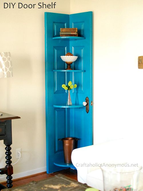 15 Creative Upcycled Door DIY Projects- Don't throw out old doors! There are so many useful and pretty upcycled door DIY projects you could make! You can make a DIY table, bookcase, and more! | repurpose old doors, reuse old doors, #upcycling #diyProject #diy #upcycle #ACultivatedNest