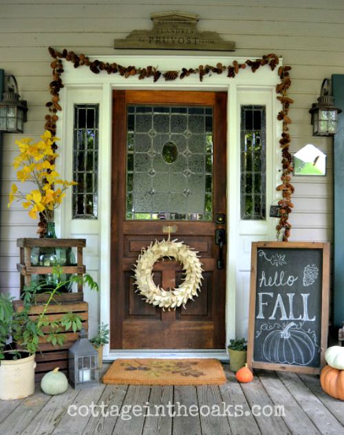 Wide Fall Front Porch- Unsure how to decorate your front porch for autumn? Take a look at these 15 fabulous fall front porch ideas and be inspired! | #fall #porchDecor #decorating #fallDecor #ACultivatedNest