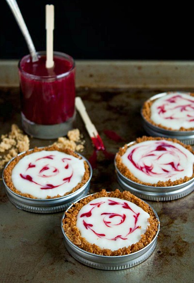 White Chocolate Raspberry Mini Tarts- If you've never tried making Mason jar lid desserts, then you're missing out! They're delicious, and the perfect size for party treats!