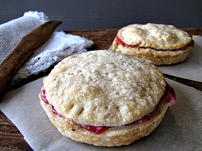 Rhubarb Mason Jar Lid Pies- If you've never tried making Mason jar lid desserts, then you're missing out! They're delicious, and the perfect size for party treats!