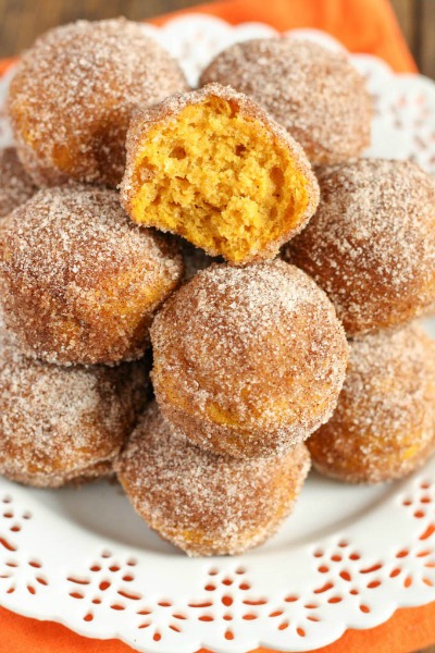Baked Pumpkin Donut Holes- Not only are pumpkins full of healthy nutrients, but they're also really tasty! This fall, try some of these pumpkin dessert recipes! | #dessert #pumpkin #recipes #pumpkinRecipes #ACultivatedNest
