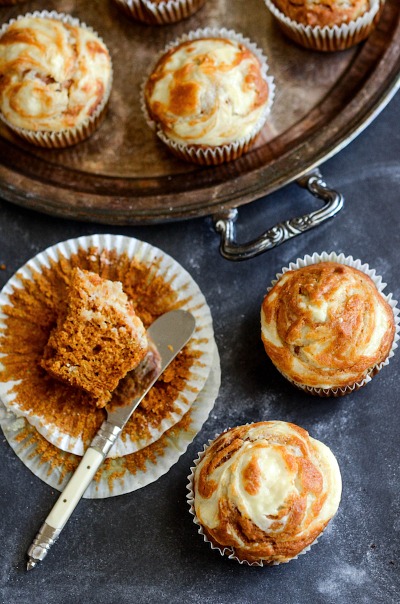 Pumpkin Cream Cheese Swirl Muffins- Not only are pumpkins full of healthy nutrients, but they're also really tasty! This fall, try some of these pumpkin dessert recipes! | #dessert #pumpkin #recipes #pumpkinRecipes #ACultivatedNest