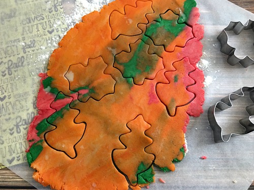 These colorful fall leaf cookies are perfect for parties, or just as a fun fall dessert! They're also really easy to make and kids love to help with them!