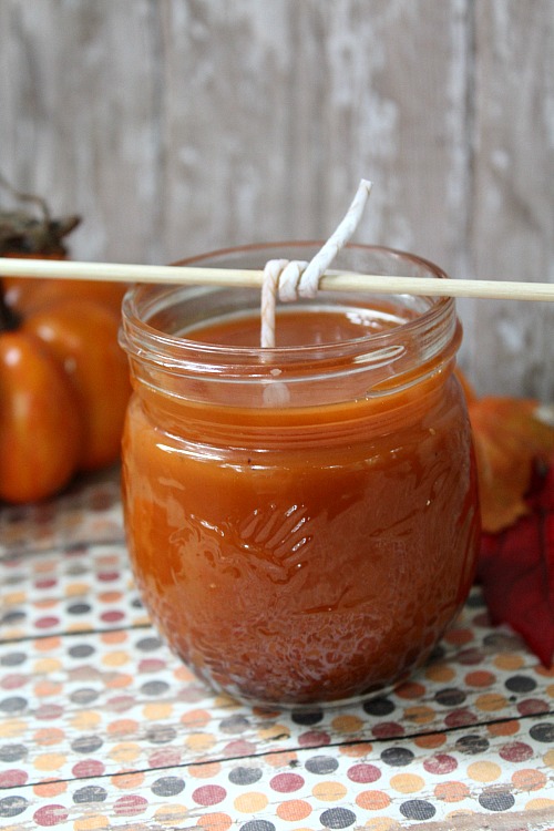 Want a lovely fall scented candle for your home? Skip the expensive brands and the dangerous paraffin and make this DIY pumpkin spice soy candle!