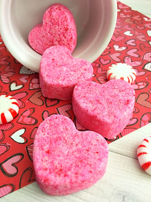 Heart-Shaped Bath Bombs- These cute DIY heart-shaped bath bombs would make lovely gifts for Valentine's Day, Mother's Day, or birthdays! And they're so quick and easy to make! | pink, homemade, handmade, homemade gift, handmade Christmas gift, handmade Valentine's Day gift, homemade beauty product, DIY beauty, #diy, #ValentinesDay #bathBomb #beauty