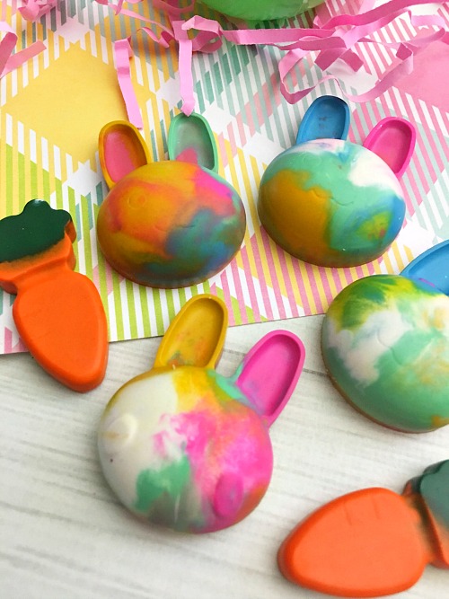 Cute and Colorful DIY Bunny Crayons- Coloring is much more fun if your kids have custom-shaped crayons! Here's how to easily make your own cute and colorful DIY bunny crayons! These would make great Easter basket gifts! | custom crayon, kids' art supplies, Easter crayons, rabbit, carrot crayons #Easter #diy #craft #coloring