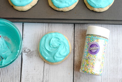 Aqua Blue Frosted Copycat Lofthouse Cookies- There's no need to go to the store for some delicious cookies! Here's how to make homemade aqua blue frosted copycat Lofthouse sugar cookies! | homemade desserts, baking, homemade frosting, spring, Easter, Mother's Day, birthday, Frozen, copycat recipe, sprinkles
