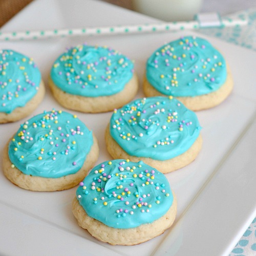 Aqua Blue Frosted Copycat Lofthouse Cookies- There's no need to go to the store for some delicious cookies! Here's how to make homemade aqua blue frosted copycat Lofthouse sugar cookies! | homemade desserts, baking, homemade frosting, spring, Easter, Mother's Day, birthday, Frozen, copycat recipe, sprinkles