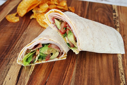 Bacon Turkey Club Wrap- Wraps are like healthier versions of sandwiches, and make easy lunches! Here's how to make a delicious bacon turkey club wrap with avocado! | no mayonnaise, mayonnaise free, quick lunch, fast lunch, bacon, turkey, avocado, easy recipe