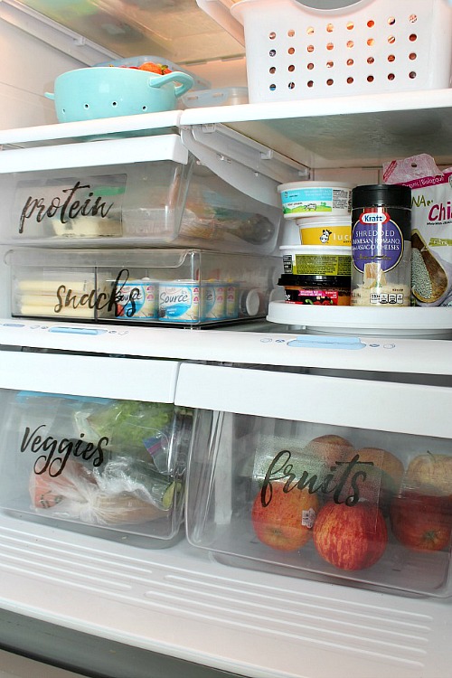 Fridge Organization Ideas- Tired of your disorganized fridge? Then you'll love these clever fridge organizing ideas! They'll help get you organized, and gain fridge space! | #organization #homeOrganization #kitchenOrganizing #fridgeOrganization #ACultivatedNest