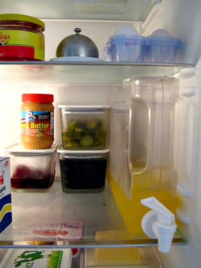 Fridge Organization Ideas- Tired of your disorganized fridge? Then you'll love these clever fridge organizing ideas! They'll help get you organized, and gain fridge space! | #organization #homeOrganization #kitchenOrganizing #fridgeOrganization #ACultivatedNest