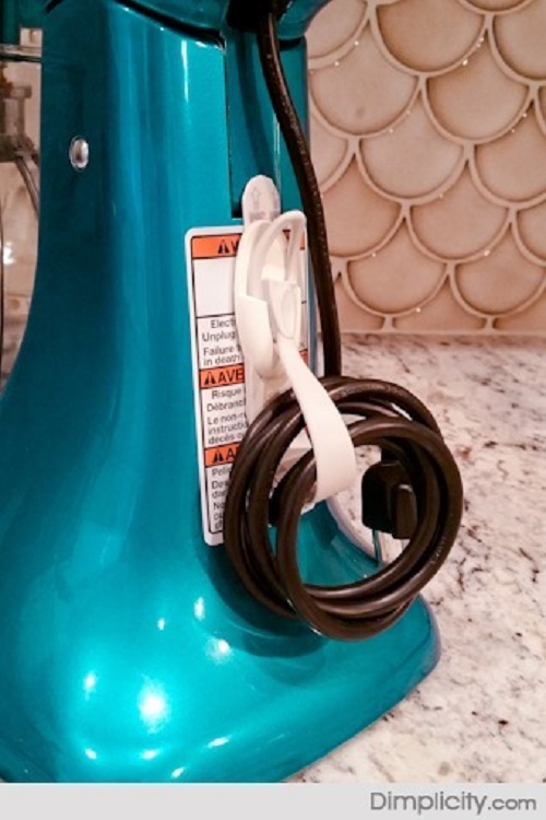 Kitchen Aid Cord Command Hook Organizer- Command Hooks can be amazing home organization tools if used the right way! For some great inspiration, check out these 10 amazing Command Hook hacks! | organizing tips, organization hacks, pantry organization, bathroom organization, kitchen organization, organize your home, #organizing #homeOrganization #ACultivatedNest