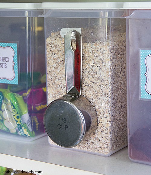 Command Hook Food Storage Hack- Command Hooks can be amazing home organization tools if used the right way! For some great inspiration, check out these 10 amazing Command Hook hacks! | organizing tips, organization hacks, pantry organization, bathroom organization, kitchen organization, organize your home, #organizing #homeOrganization #ACultivatedNest