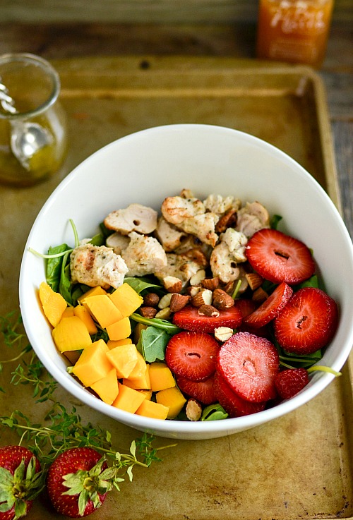 Strawberry Mango Grilled Chicken Salad- A delicious way to use up extra grilled chicken from your last barbecue is to make this strawberry mango grilled chicken salad! | healthy, ways to use rotisserie chicken, easy, summer salad, quick, lunch, dinner, fresh fruit